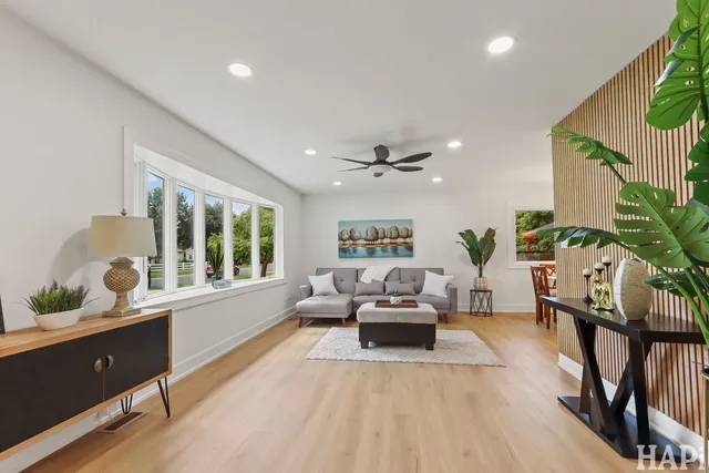 a living room with furniture and a window