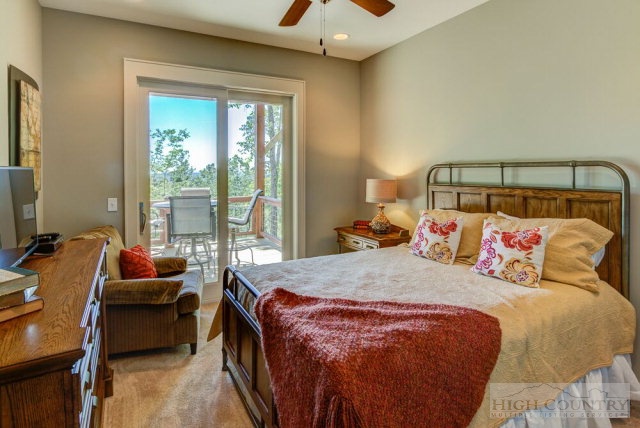 14 Goldenrod Road Boone, NC 28607 - Photo 15 of 16 a bedroom with a bed and a window
