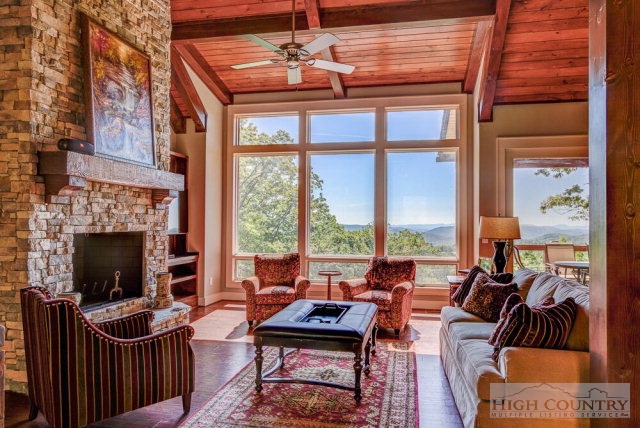 14 Goldenrod Road Boone, NC 28607 - Photo 6 of 16 a living room with furniture a fireplace and a table