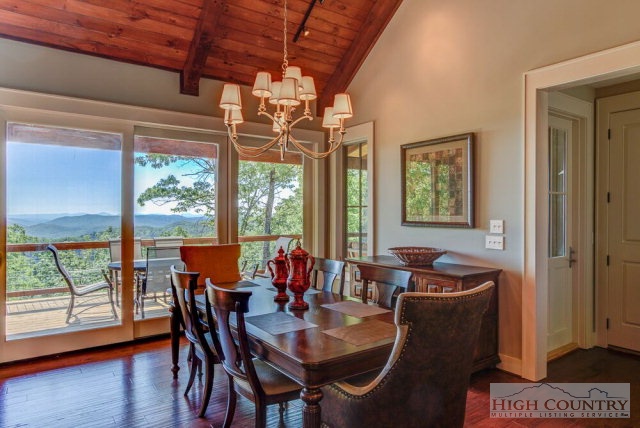 14 Goldenrod Road Boone, NC 28607 - Photo 8 of 16 a view of a dining room with furniture window and wooden floor