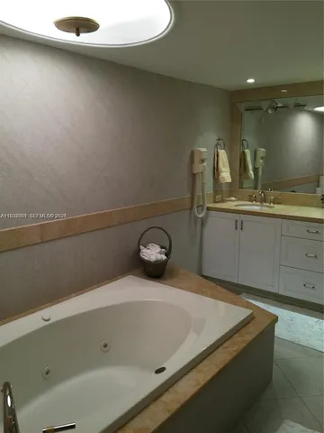 a bathroom with a sink and a vanity