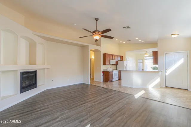 a view of a kitchen with a sink and a kitchen counter top