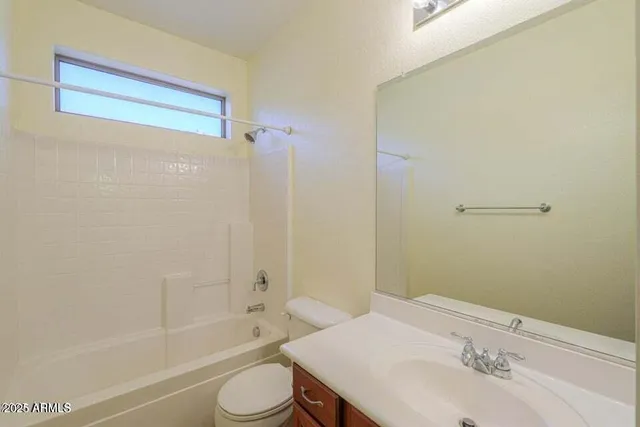 a bathroom with a sink and toilet