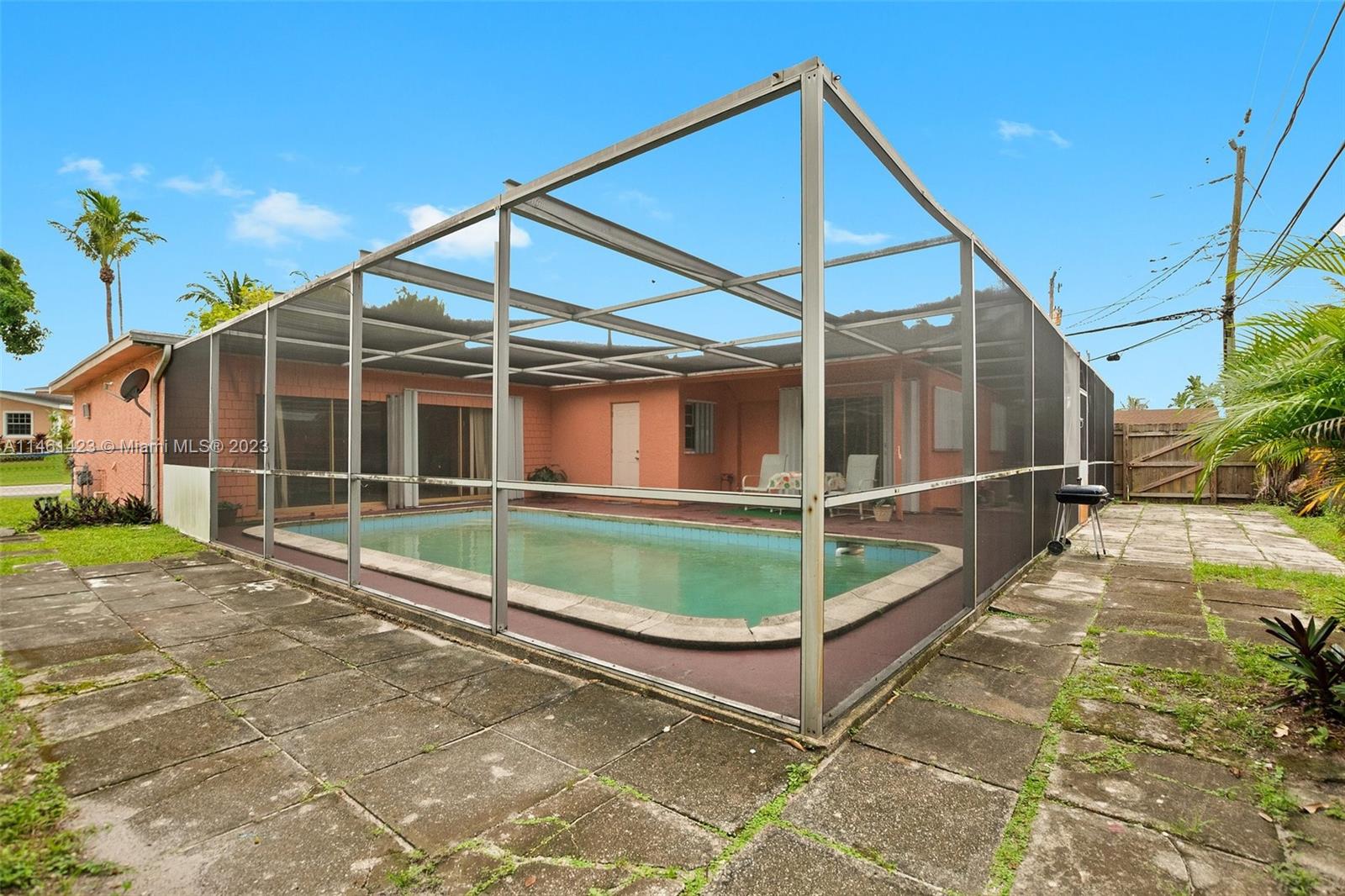 3405 East Shore Road Miramar, FL 33023 - Photo 25 of 25 a house view with a backyard space