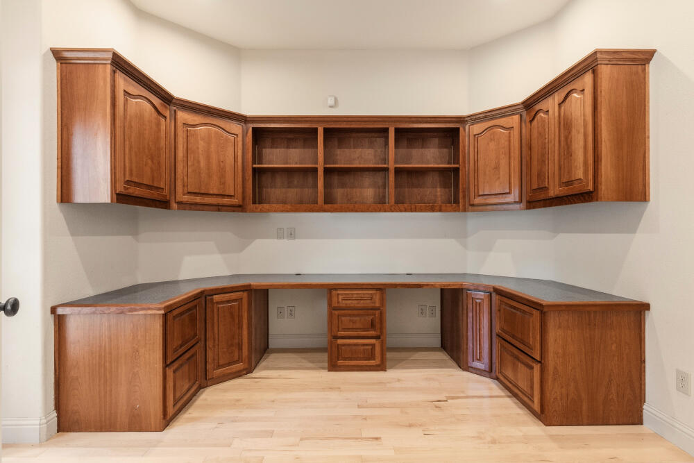 11756 Merganser Road Klamath Falls, OR 97601 - Photo 11 of 73 a kitchen with stainless steel appliances granite countertop wooden cabinets a sink and dishwasher