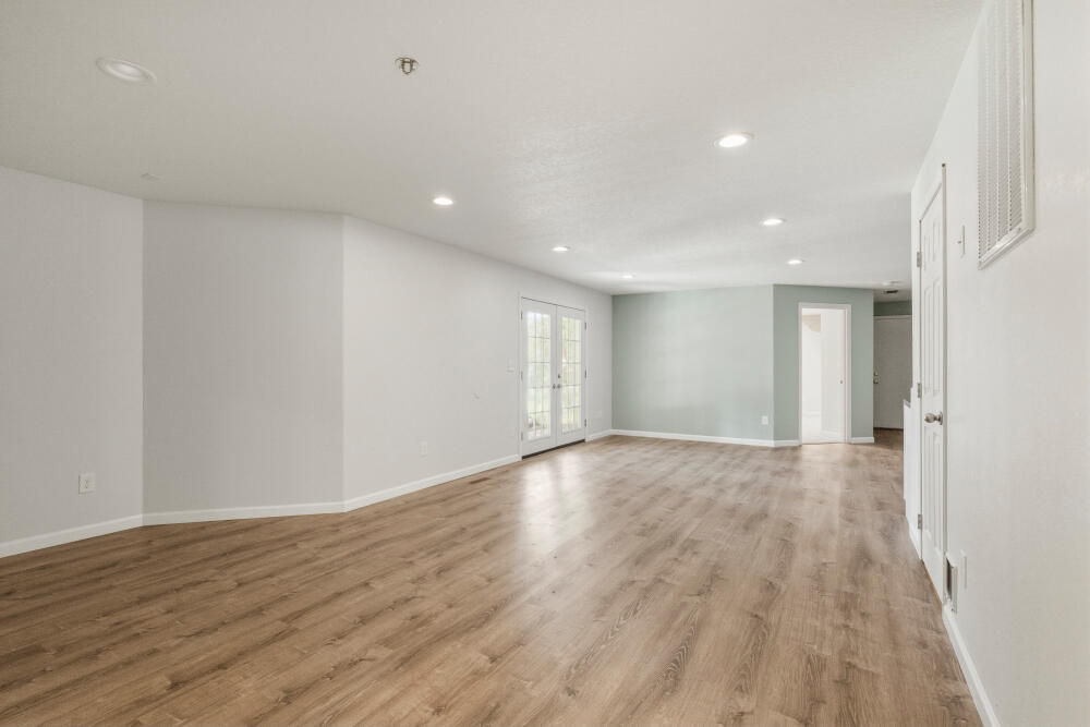 11756 Merganser Road Klamath Falls, OR 97601 - Photo 56 of 73 a view of an empty room with wooden floor and closet