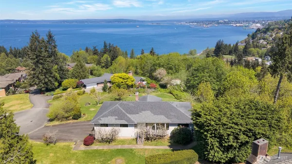 aerial view of a house with a garden