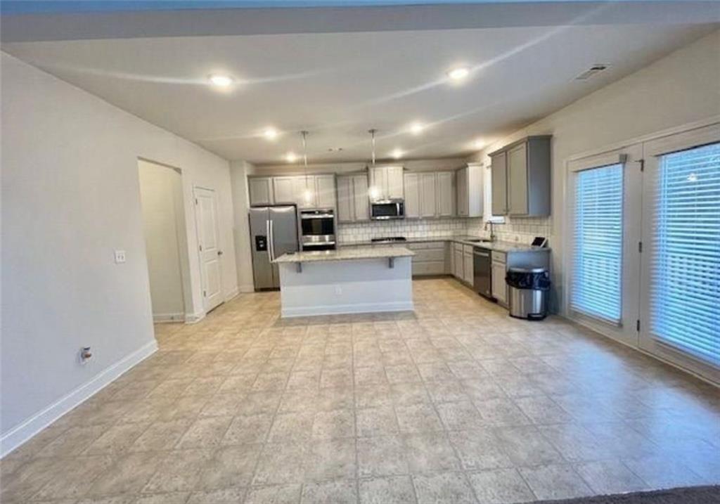 181 Charolais Drive McDonough, GA 30252 - Photo 11 of 25 a view of a kitchen with a sink and cabinets