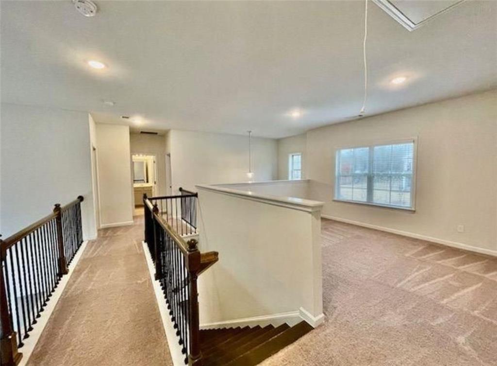 181 Charolais Drive McDonough, GA 30252 - Photo 17 of 25 a view of a hallway with stairs