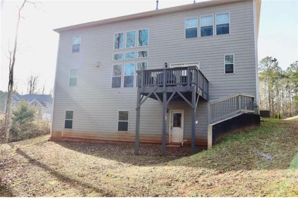 181 Charolais Drive McDonough, GA 30252 - Photo 24 of 25 a front view of a house with a yard