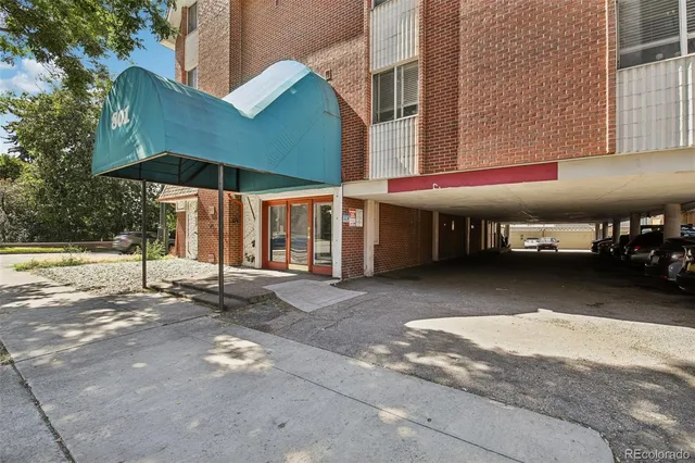 a view of a cafe with sitting area
