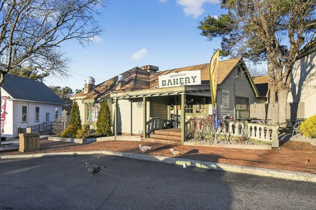a front view of a building with street view