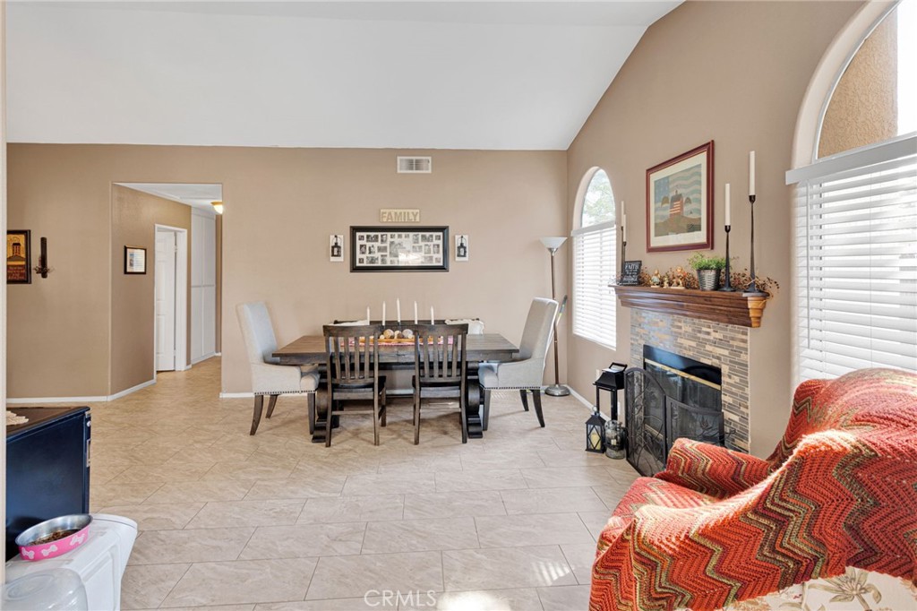 20403 Ochoa Road Apple Valley, CA 92307 - Photo 25 of 48 a living room with furniture fireplace and flat screen tv