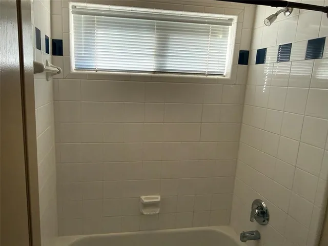 a view of a bathroom with a window