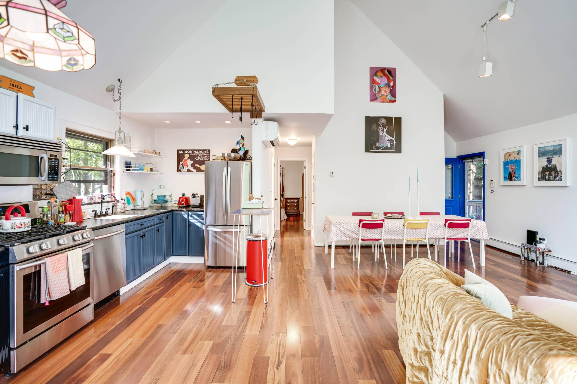 62 Broadway East Hampton, NY 11937 - Photo 3 of 20 a living room with stainless steel appliances kitchen island furniture and a wooden floor
