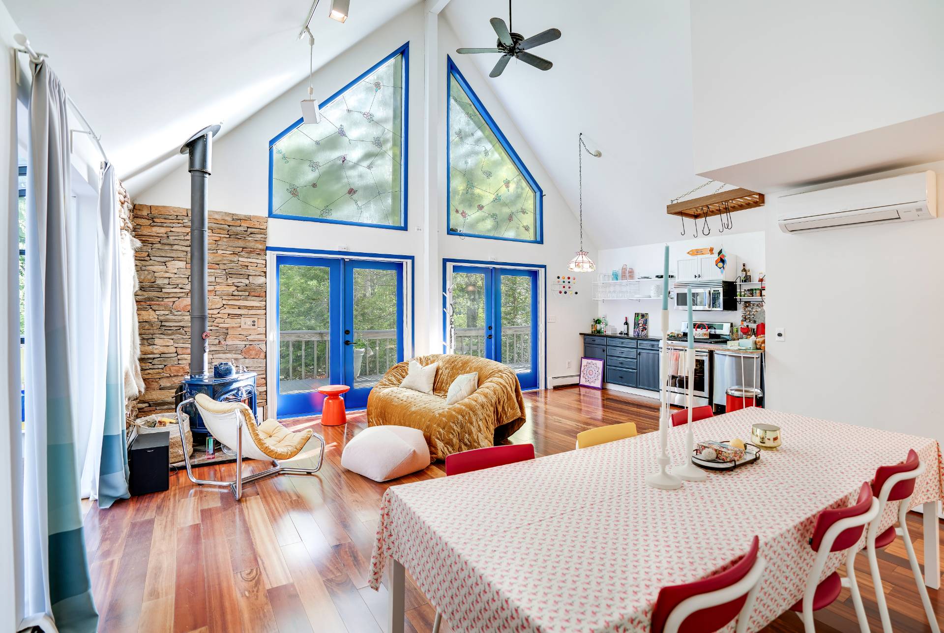 62 Broadway East Hampton, NY 11937 - Photo 5 of 20 a bedroom with furniture and a large window