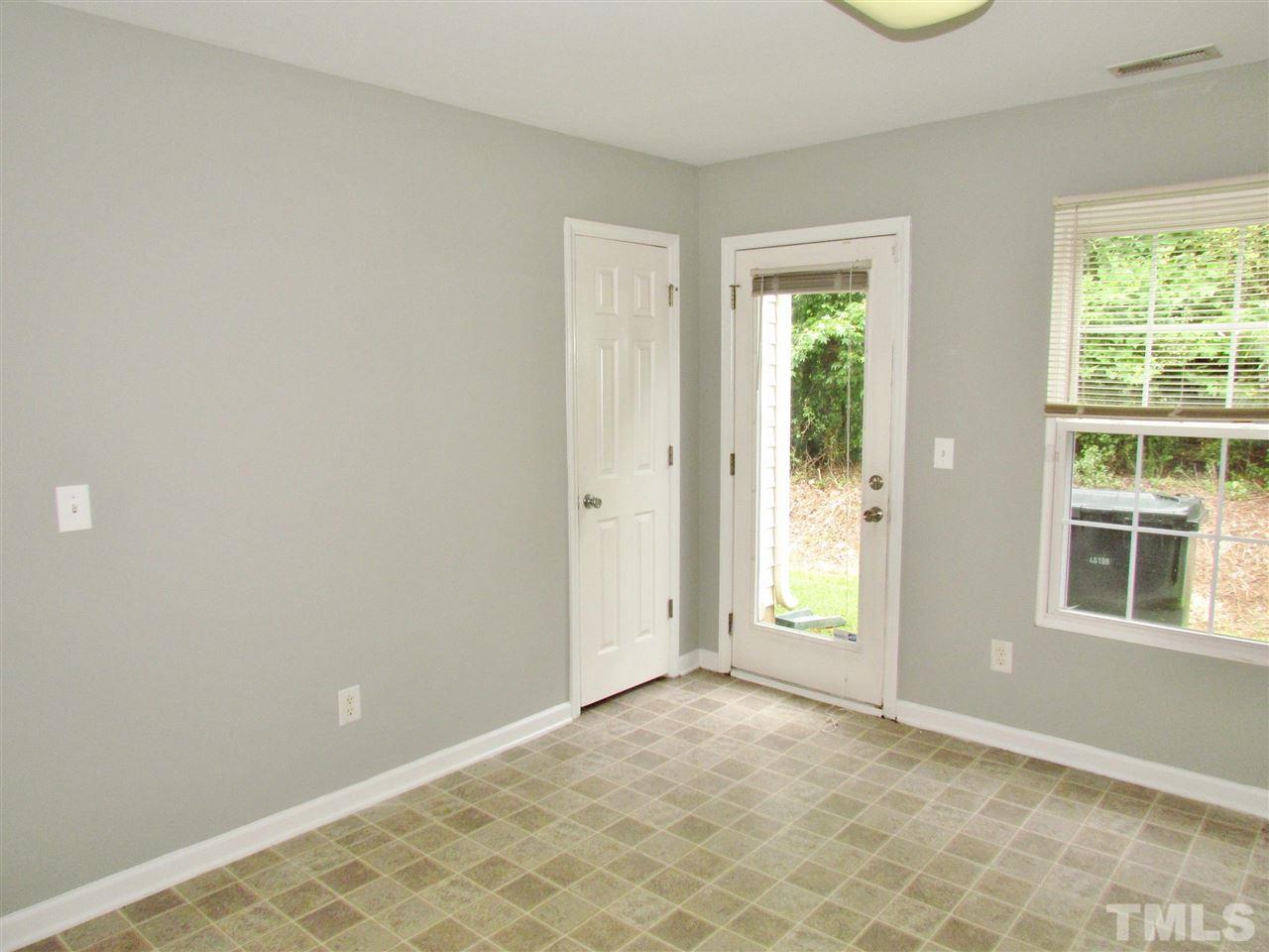 905 Roxy Street Raleigh, NC 27610 - Photo 14 of 30 an empty room with windows