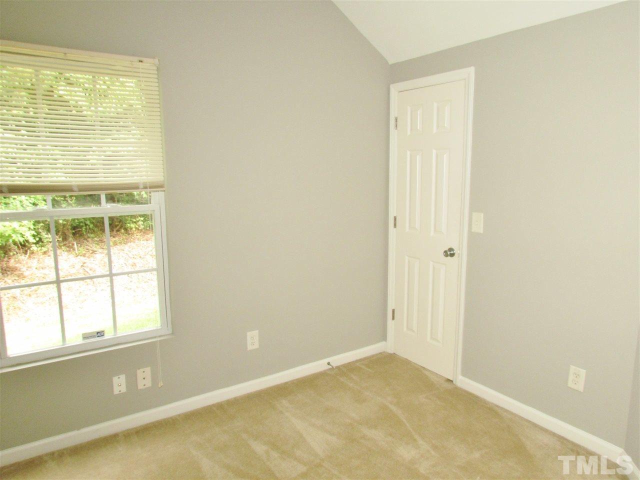 905 Roxy Street Raleigh, NC 27610 - Photo 23 of 30 an empty room with a window