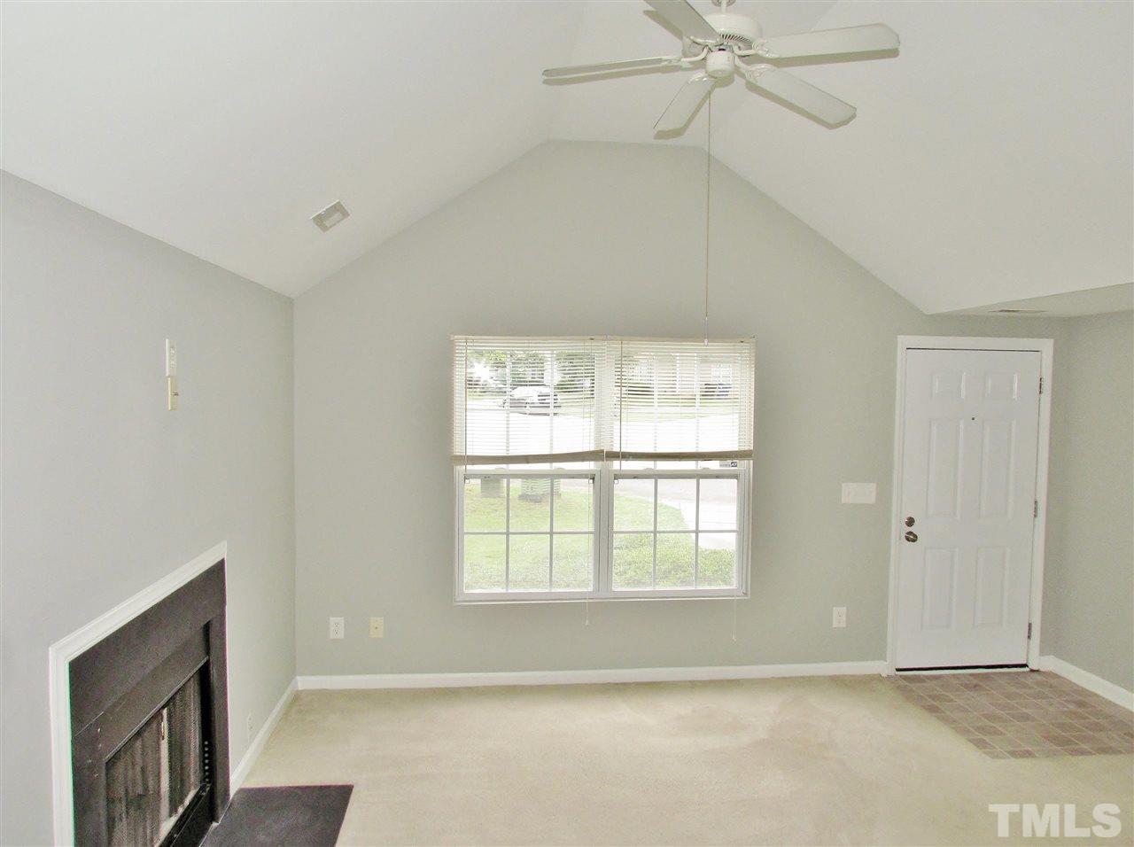 905 Roxy Street Raleigh, NC 27610 - Photo 10 of 30 a view of an empty room with a window