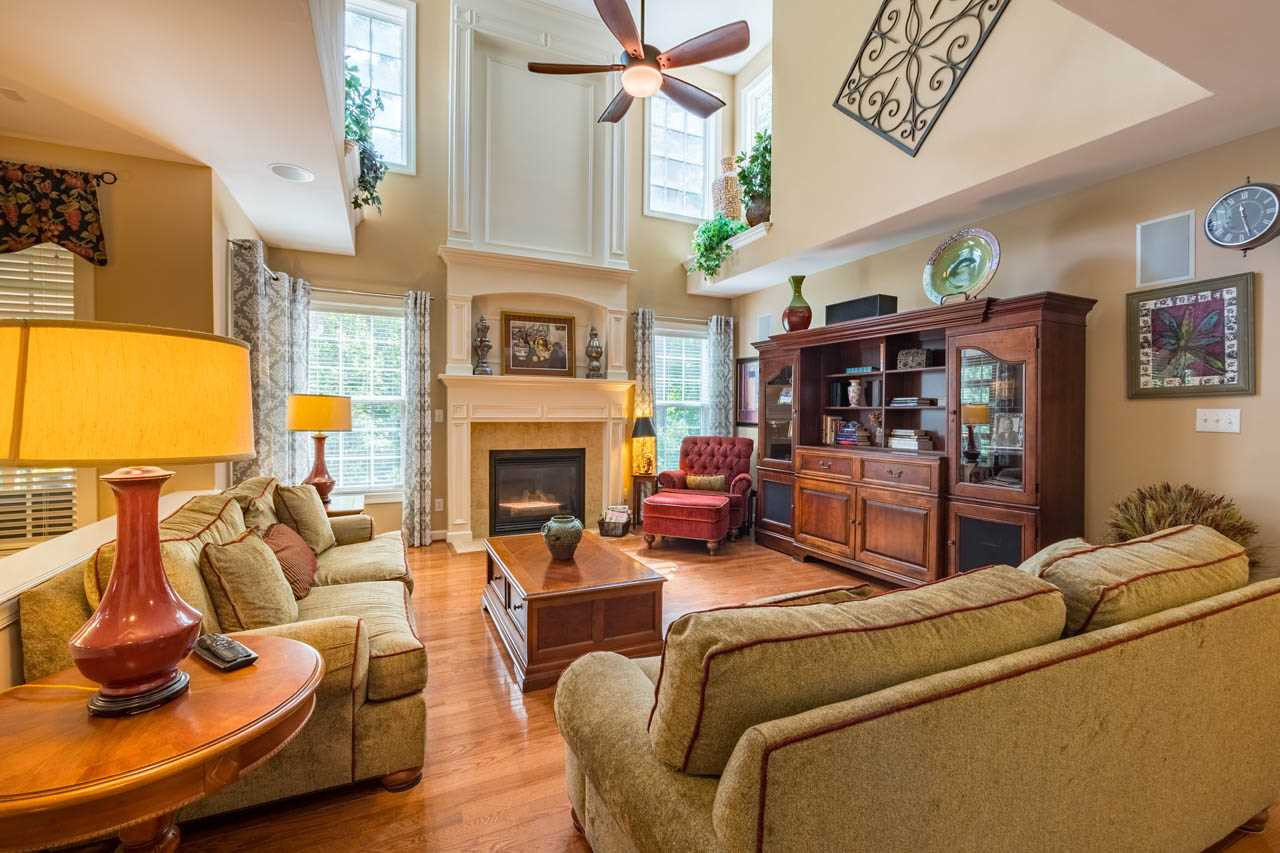 4445 Fairview Ridge Lane Apex, NC 27539 - Photo 4 of 30 Soaring ceiling, with triple mantel fireplace Family Room