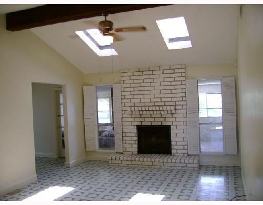 9503 Quetzal Street Corpus Christi, TX 78418 - Photo 2 of 5 a view of a livingroom with a fireplace