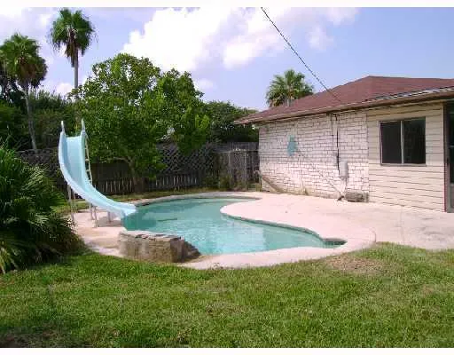 a view of a backyard with a garden