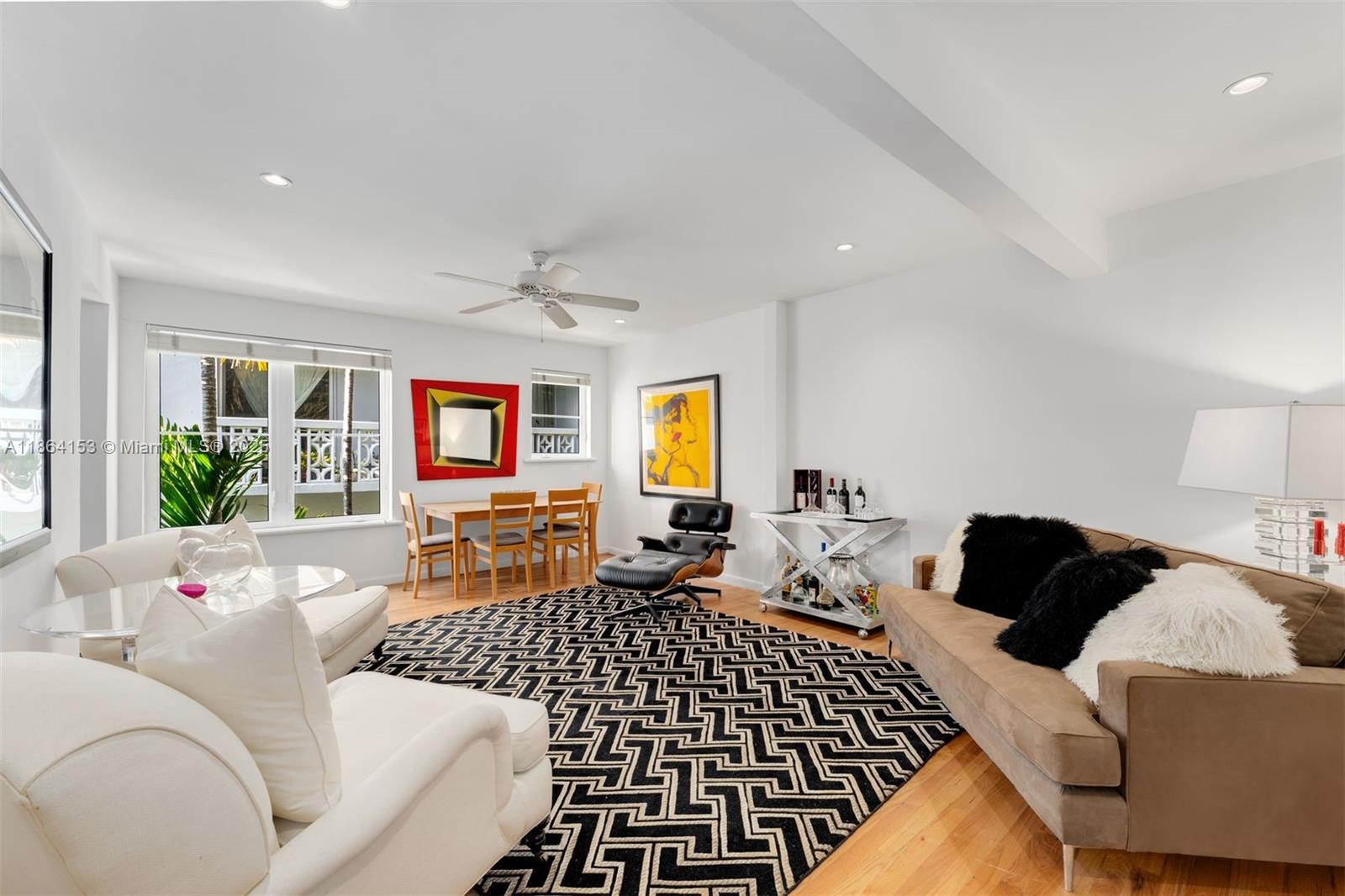 1018 Meridian Avenue, Unit 8 Miami Beach, FL 33139 - Photo 2 of 12 a living room with furniture