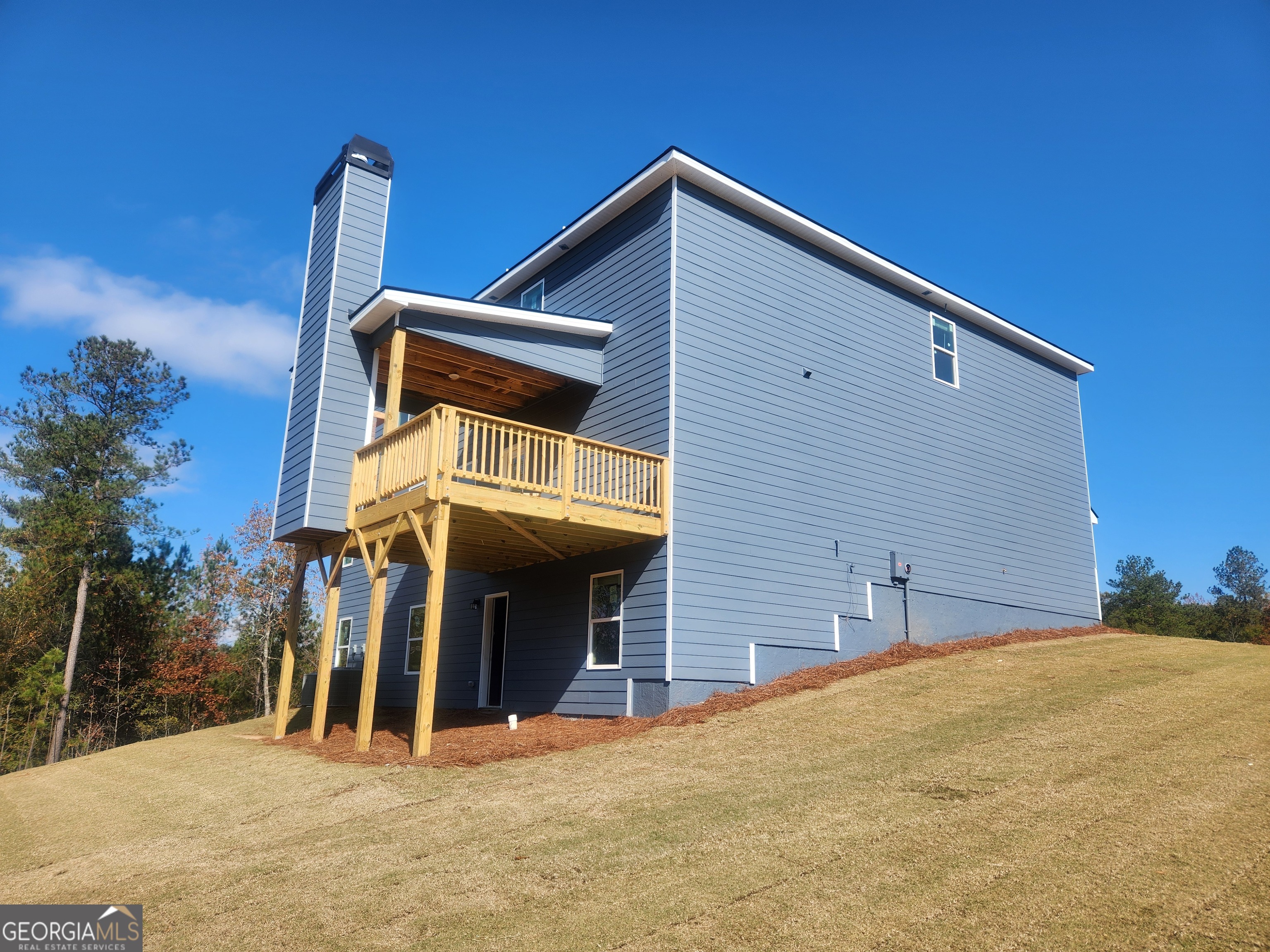 148 Post Oak Drive, Unit 139 Jackson, GA 30233 - Photo 2 of 24 a view of a house with a garage