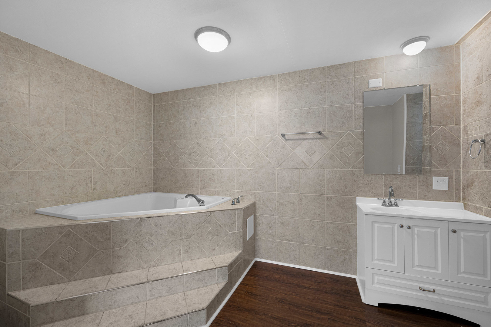 3497 Ronald Road Crete, IL 60417 - Photo 12 of 17 a bathroom with a sink a toilet and a bathtub