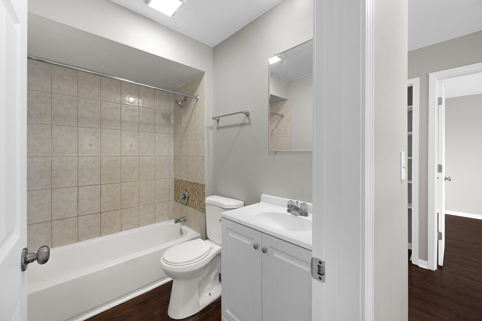 3497 Ronald Road Crete, IL 60417 - Photo 13 of 17 a bathroom with a sink a toilet and shower