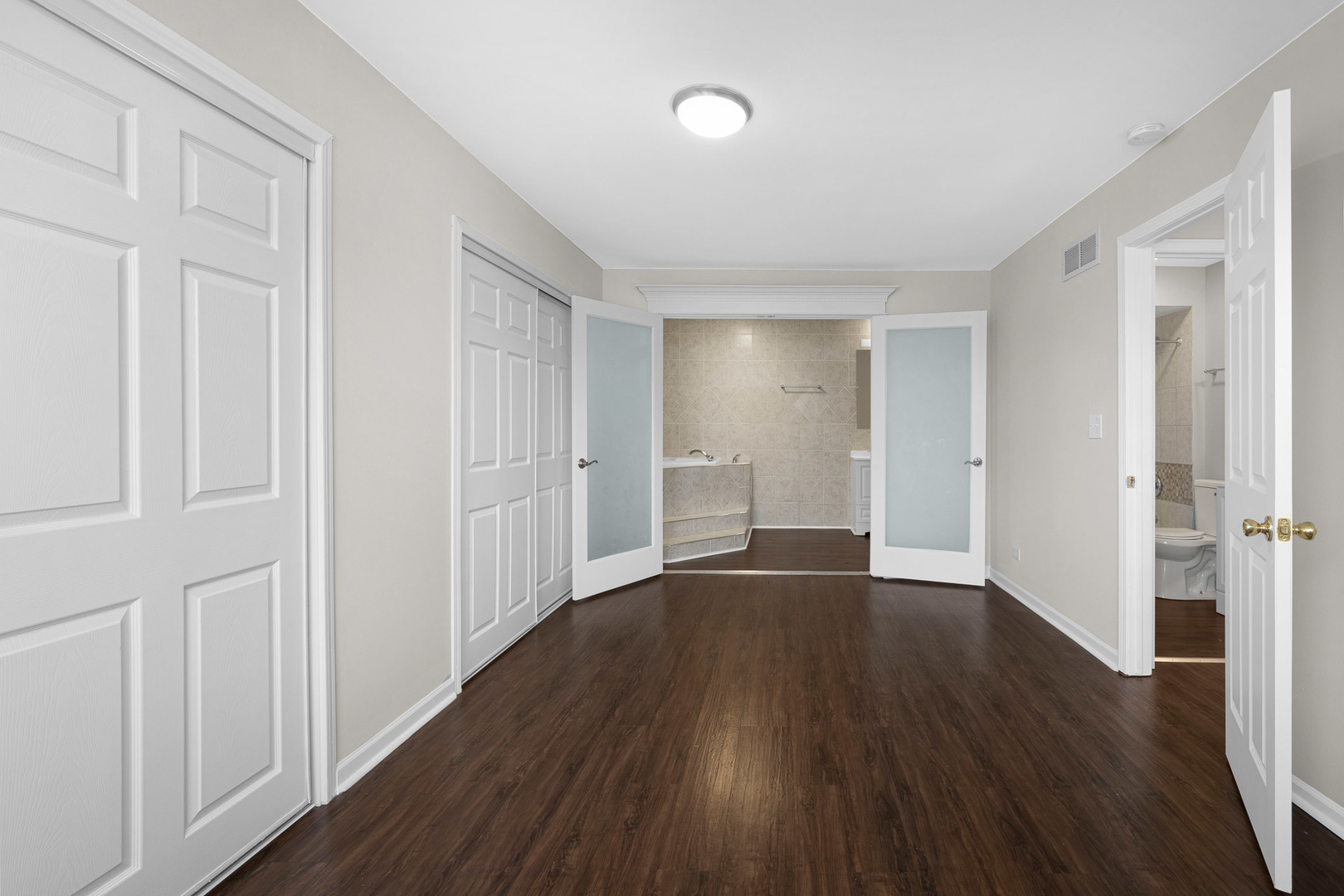 3497 Ronald Road Crete, IL 60417 - Photo 8 of 17 a view of an empty room with wooden floor