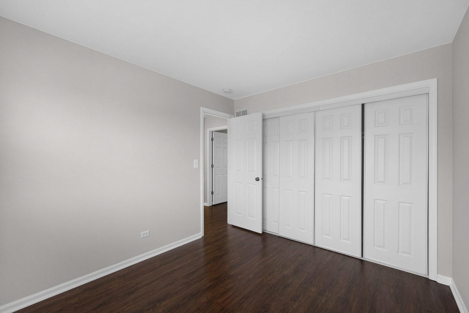3497 Ronald Road Crete, IL 60417 - Photo 10 of 17 a view of an empty room with wooden floor