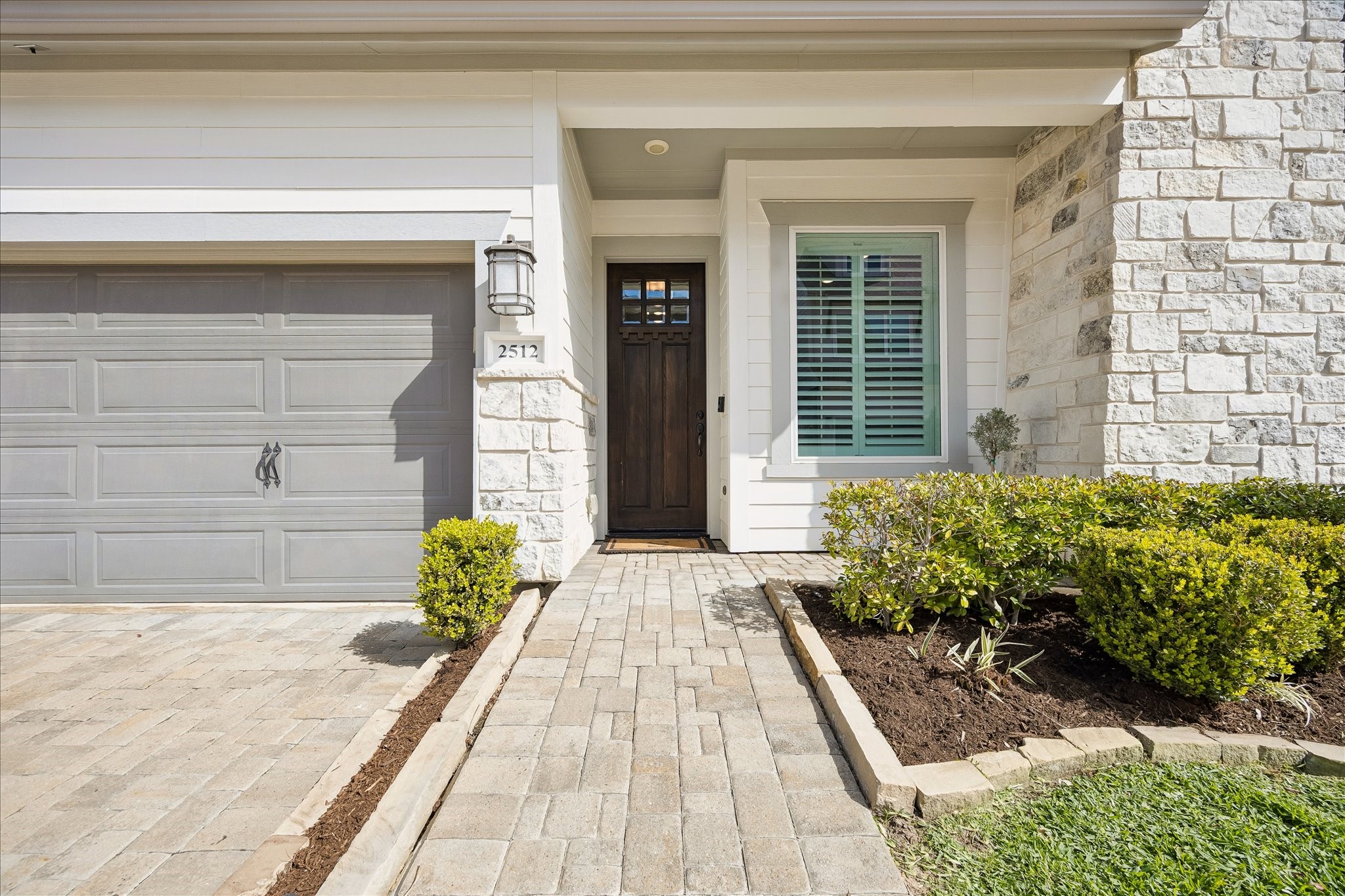 2512 Swang Pl. Houston, TX 77008 - Photo 2 of 46 Experience charming curb appeal with a welcoming covered porch and elegant wood front door.