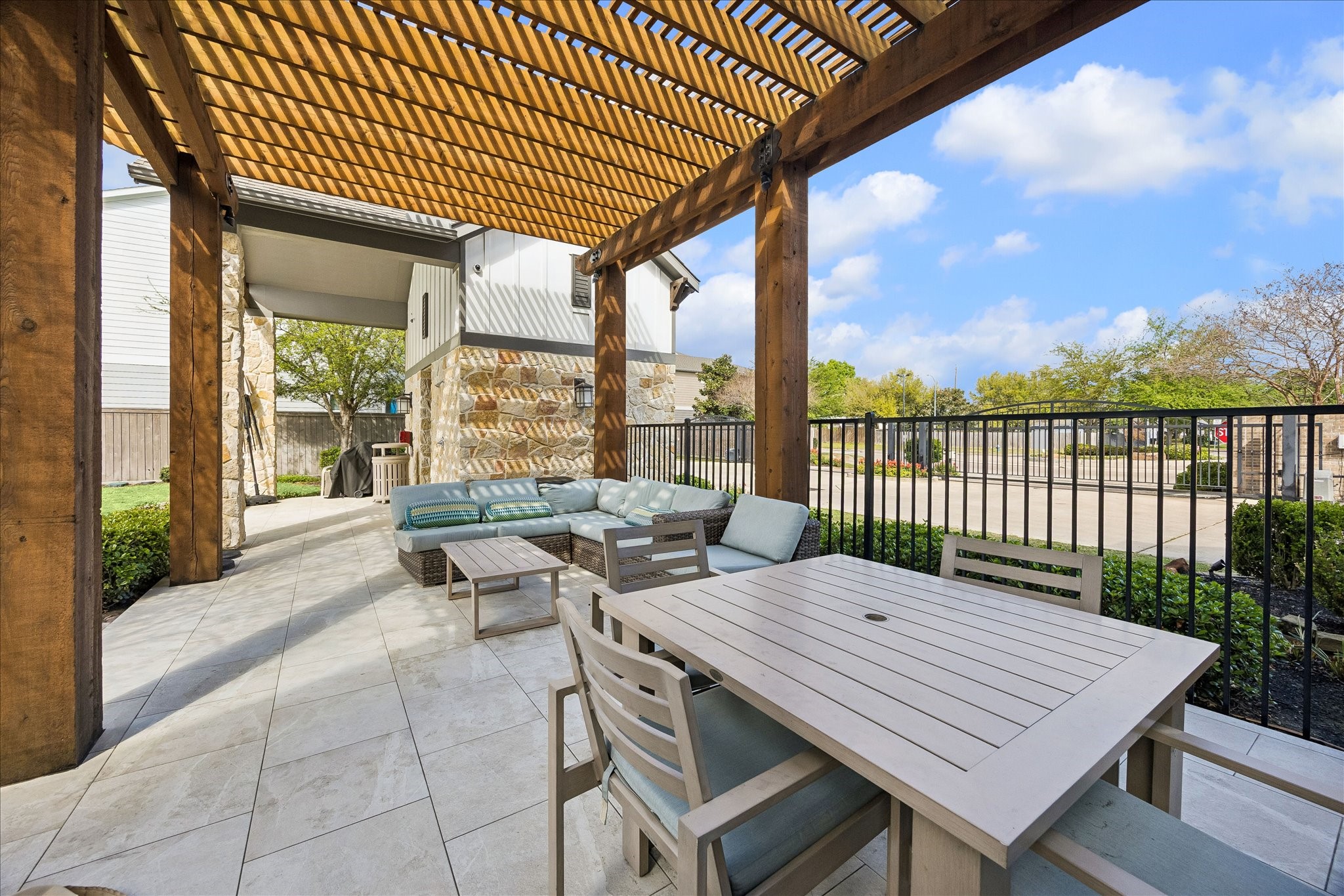 2512 Swang Pl. Houston, TX 77008 - Photo 40 of 46 Community pool area with an outdoor patio and comfortable seating.