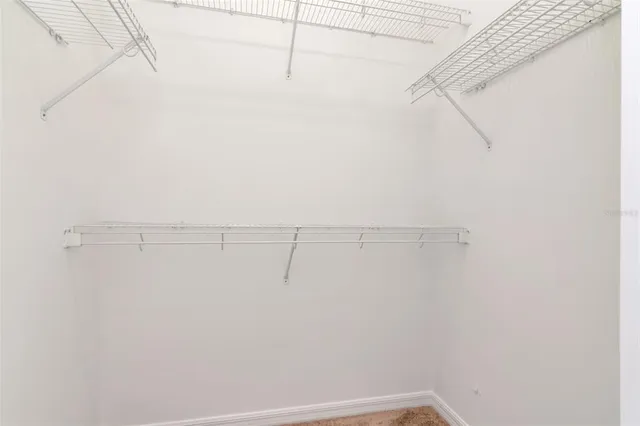 a view of a room with racks on the wall