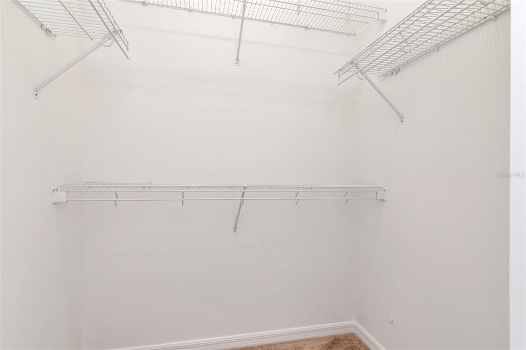 1927 Alecost Court Trinity, FL 34655 - Photo 21 of 44 a view of a room with racks on the wall