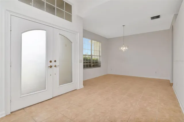 an empty room with windows