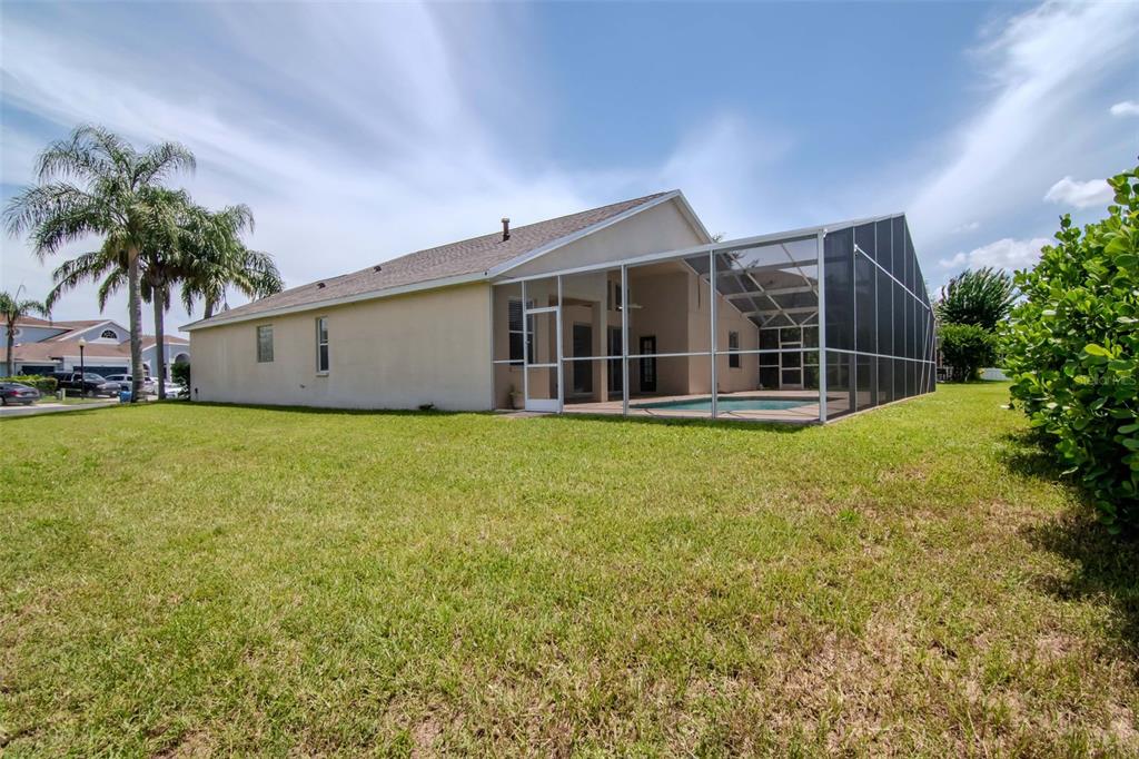 1927 Alecost Court Trinity, FL 34655 - Photo 6 of 44 a view of a house with a garden and yard