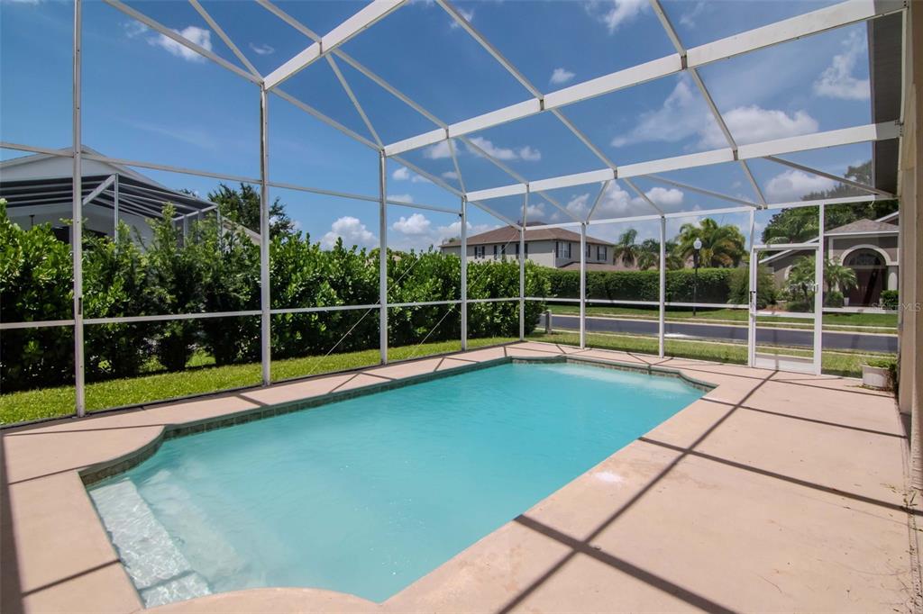 1927 Alecost Court Trinity, FL 34655 - Photo 9 of 44 a view of a backyard with swimming pool