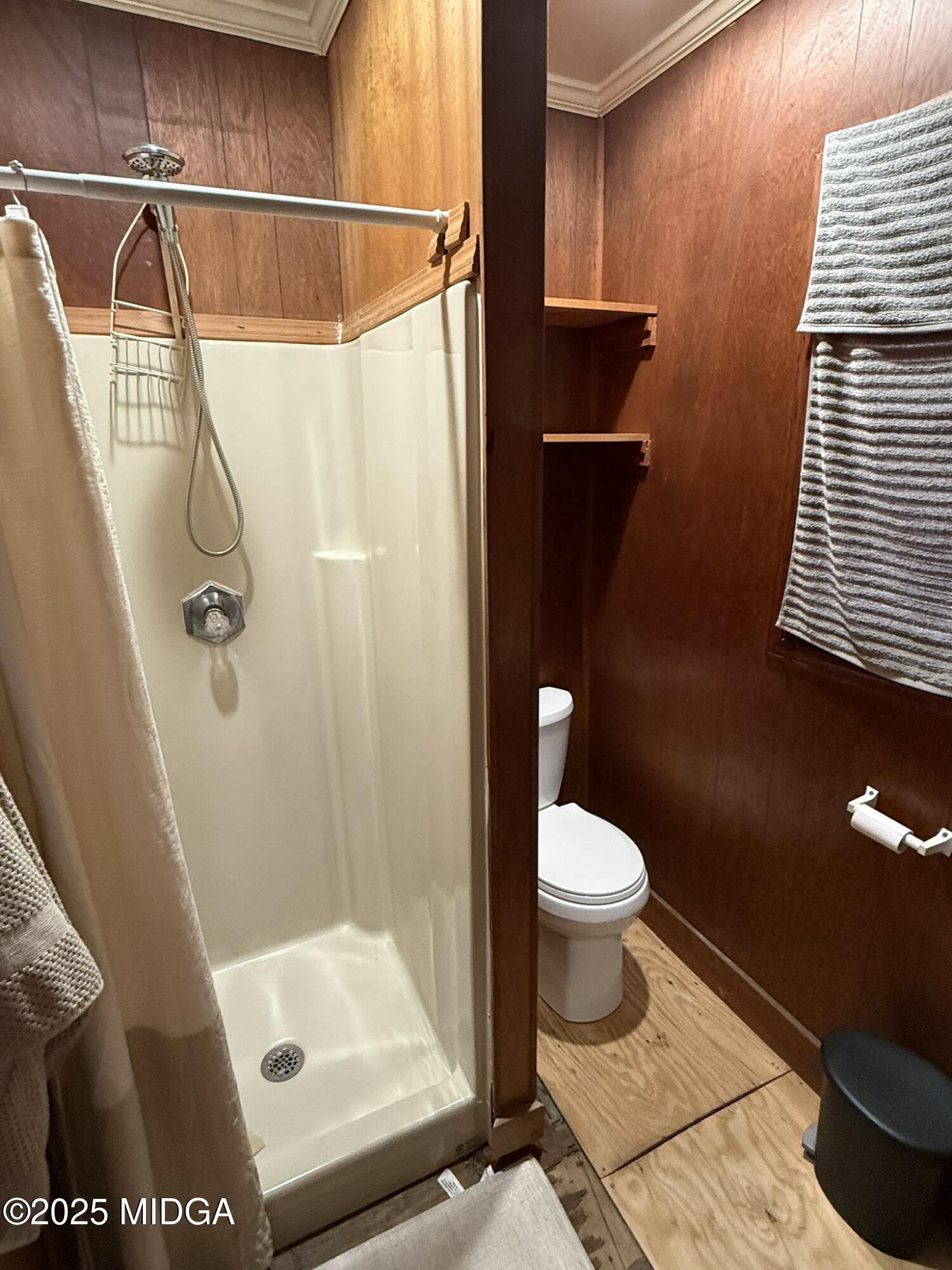 3020 Millerfield Road Macon, GA 31217 - Photo 16 of 20 a bathroom with a toilet and a shower