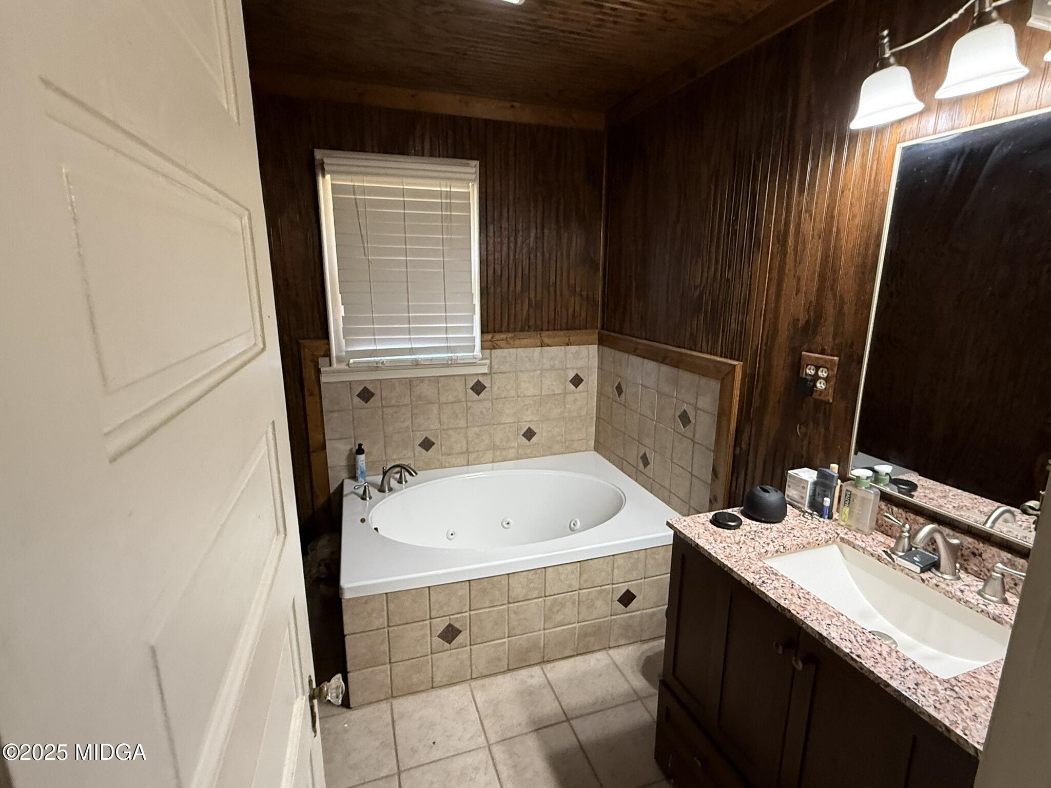 3020 Millerfield Road Macon, GA 31217 - Photo 19 of 20 a bathroom with a sink and a mirror