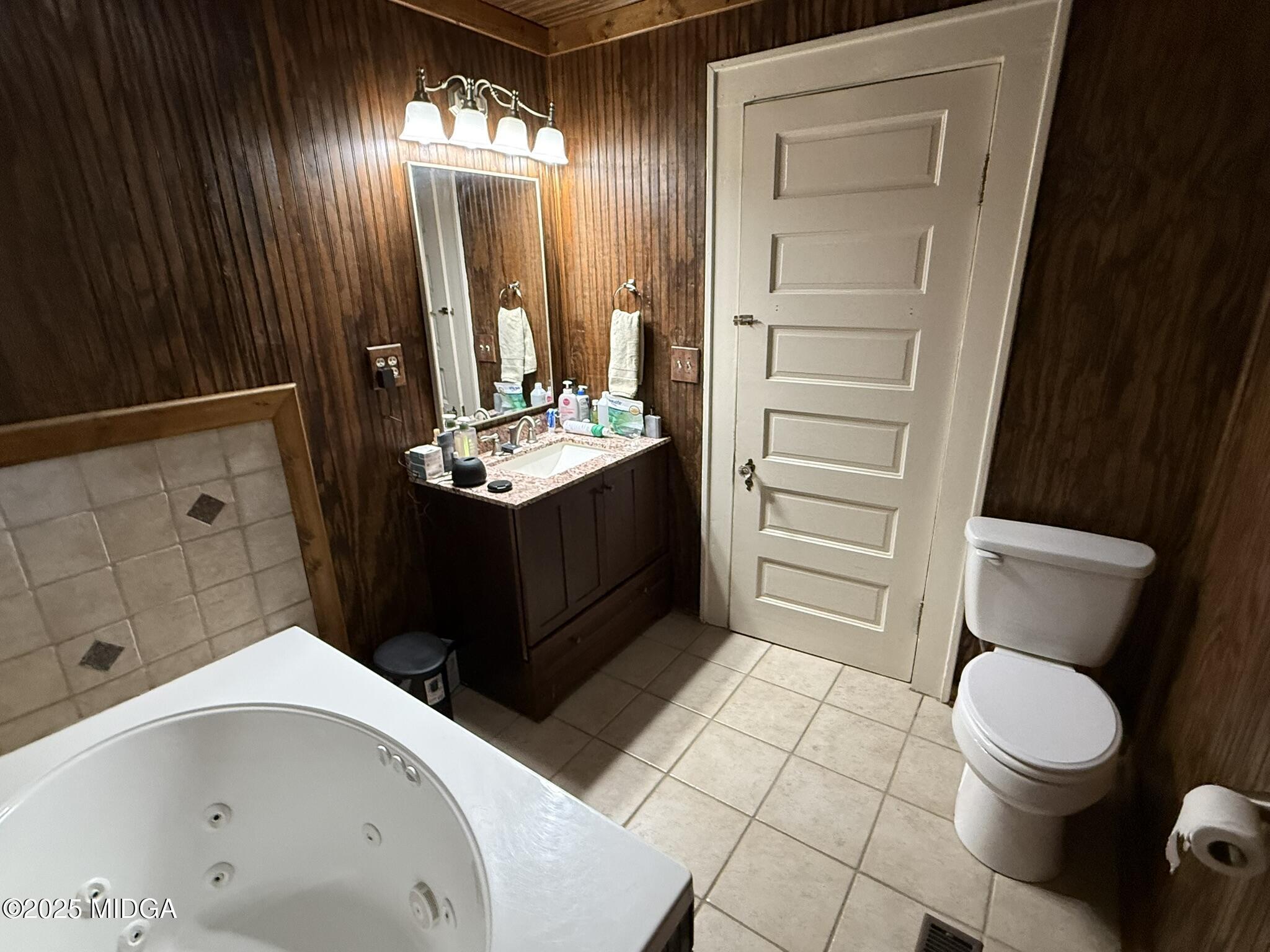 3020 Millerfield Road Macon, GA 31217 - Photo 20 of 20 a bathroom with a sink a toilet and shower