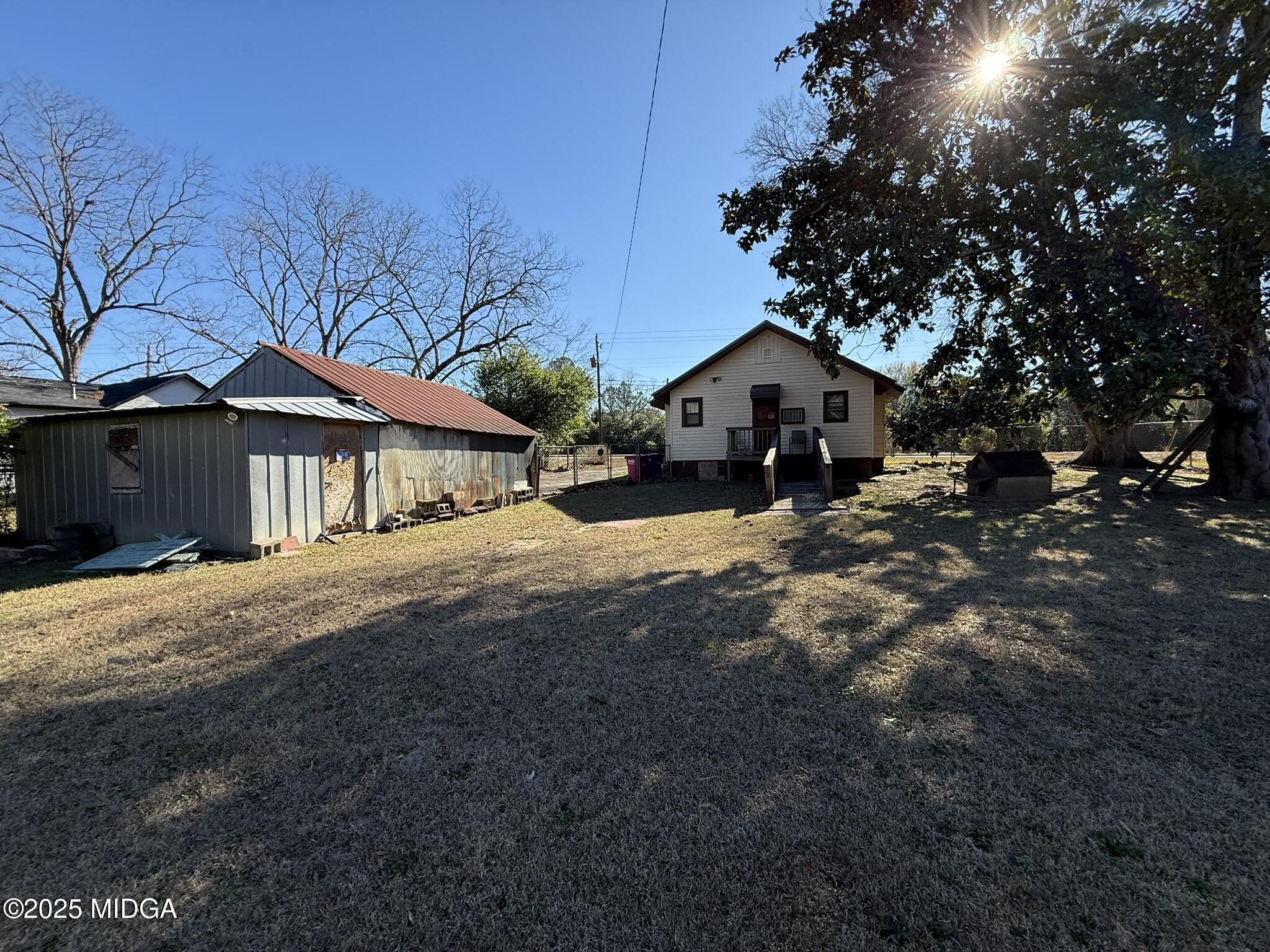 3020 Millerfield Road Macon, GA 31217 - Photo 5 of 20 a front view of a house with a yard and garage
