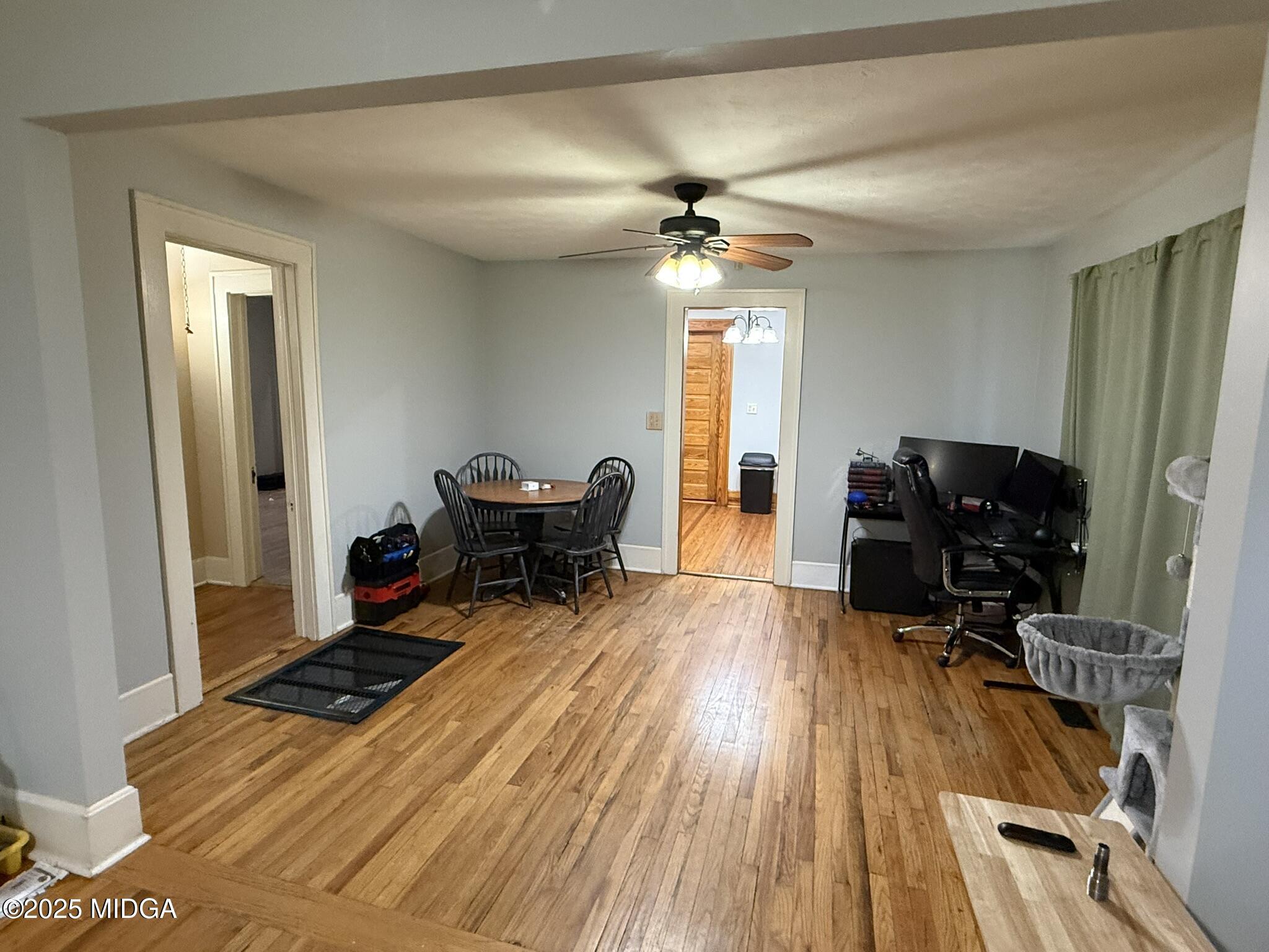 3020 Millerfield Road Macon, GA 31217 - Photo 9 of 20 a work room with furniture and wooden floor