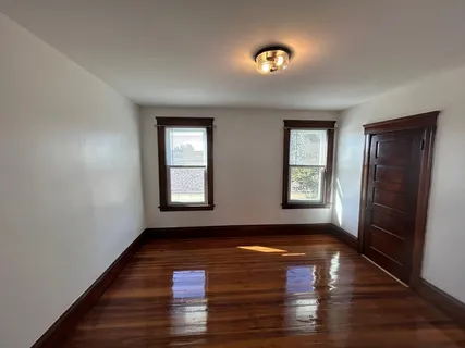 a kitchen with a refrigerator and countertop