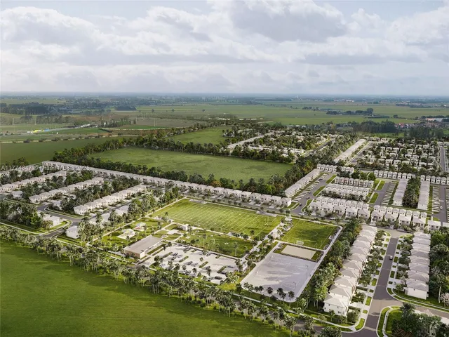 an aerial view of a city with lots of residential buildings
