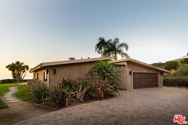 a view of a house with a outdoor space
