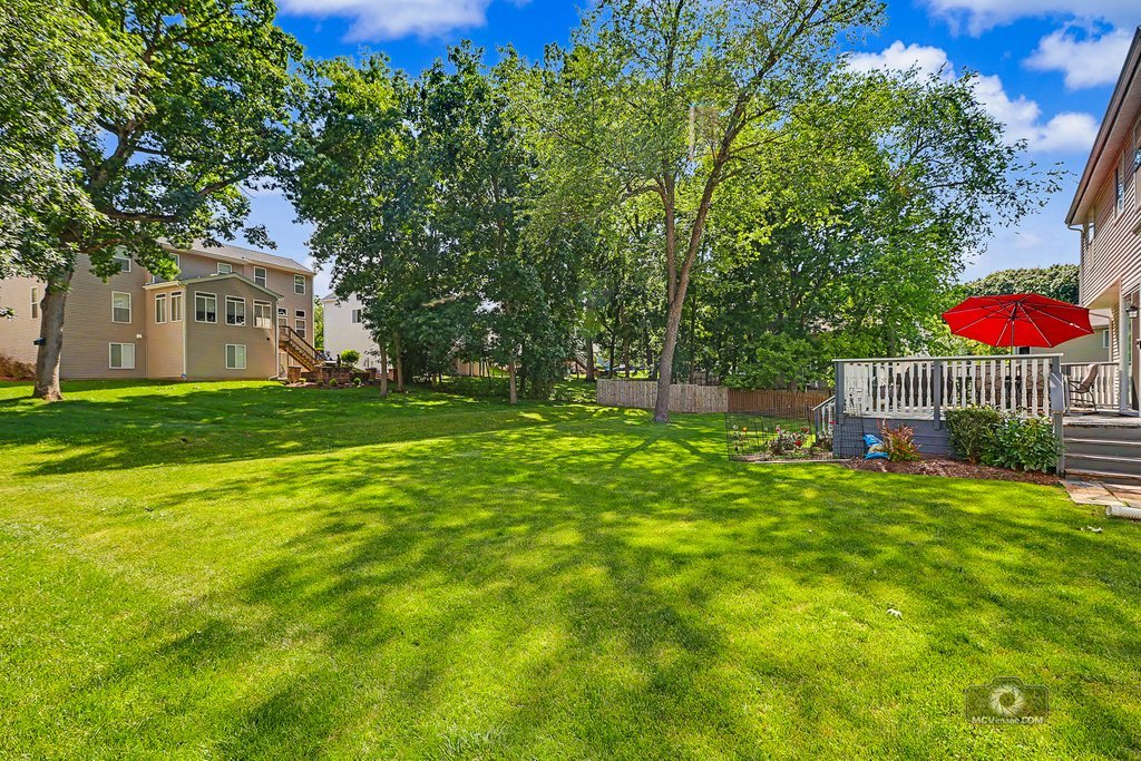 483 Elm Ridge Road Carpentersville, IL 60110 - Photo 27 of 31 a view of a house with a yard
