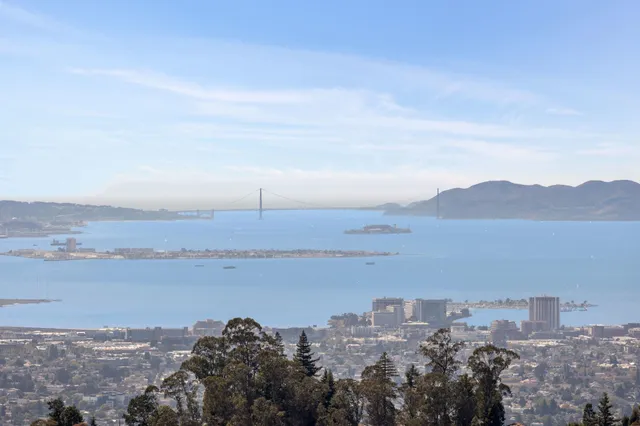 a bedroom with a bed and cabinets