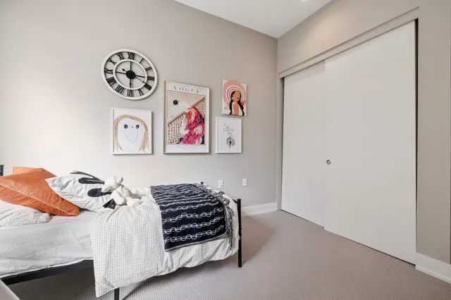 a view of a sink a counter space and a potted plant